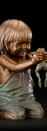 Girl holding frog bronze sculpture by world-class portrait memorial commission sculptor, Tom White.