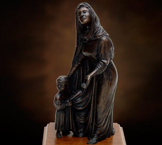 "Hannah's Gift" Statue of Hannah giving Samuel back to the Lord per her promise. Created by Tom White, sculptor in a line of Biblical inspirational tabletop bronze sculptures. Inspirational Christian gifts and statues.