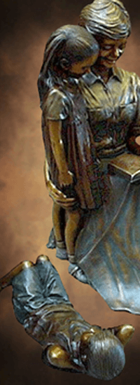 Teacher Reading to Children Sculptures, bronze portrait statue of Judy Svajgr commissioned for Wilson Public Library, Cozad, NE created by master sculptor, Tom White.