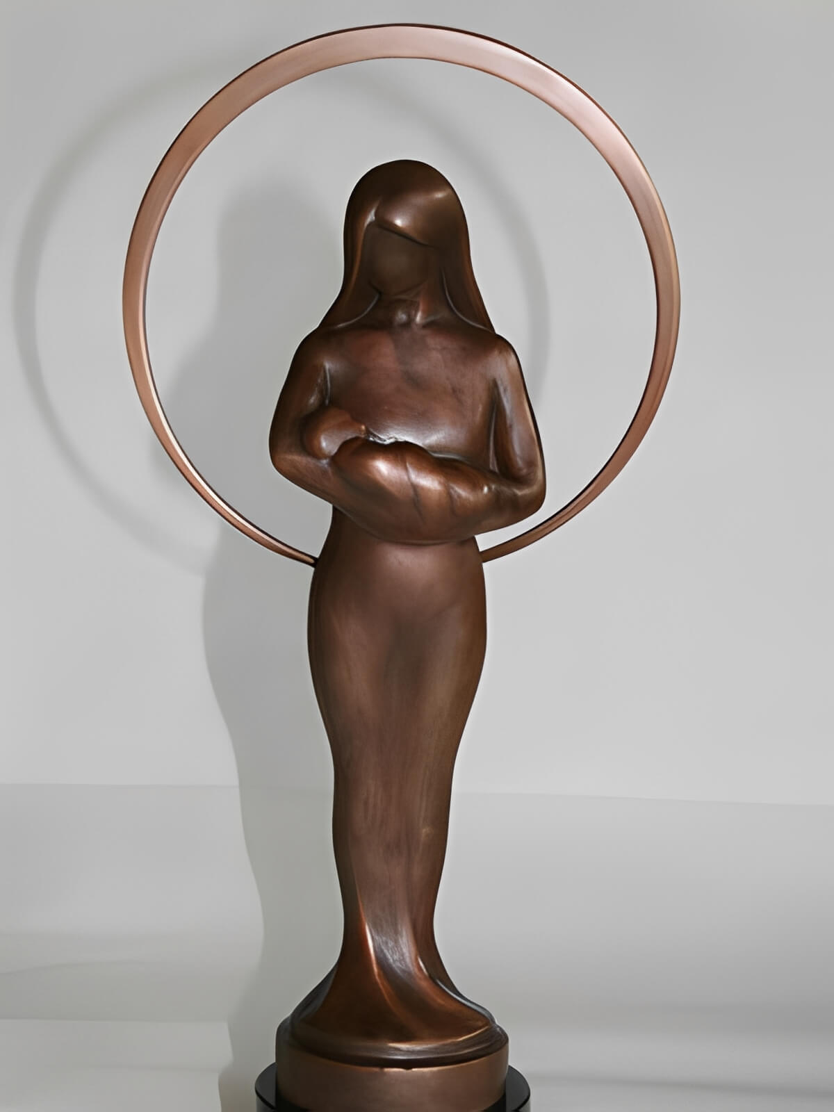 Mom & Baby Live Action Pro-life Award, bronze statue by sculptor, Tom White, to honor those who fight passionately for the lives of pre-born children.