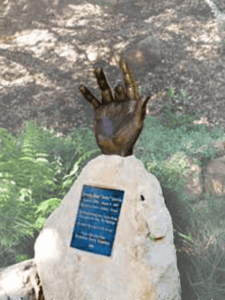 Jerry Garcia Hand bronze statue commissioned by the Santa Barbara Bowl Foundation for the Jerry Garcia Glen. Created by public monumental bronze sculptor, Tom White.