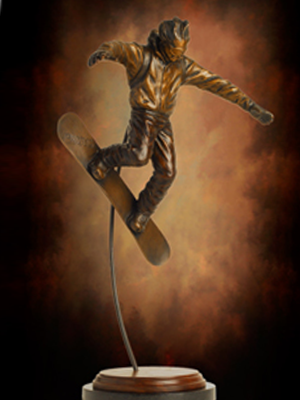 Snowboarder Sports Sculpture created by Tom White, Sculptor, as a trophy for a company&rsquo;s BAHG award. Commission a bronze sports statue or trophies for your team, entity or sports venue