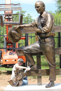 Bo Rubenstein Statue - portrait sculpture of owner of Texas Pipe for his Frebo Ranch in Columbus, Texas. Figurative memorial bronze sculptures by master Texas / Arizona commission sculptor, Tom White.