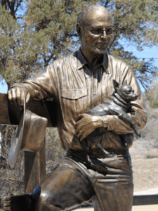 Bo Rubenstein Statue - portrait sculpture of owner of Texas Pipe for his Frebo Ranch in Columbus, Texas. Figurative memorial monumental bronze sculptures by master Texas / Arizona commission sculptor, Tom White.