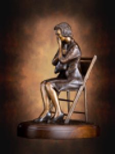 Gold Star Mom bronze sculpture, receiving flag for her fallen soldier